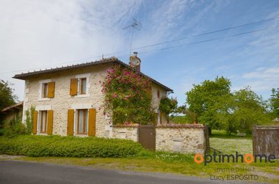 Belle maison en pierre avec jardin 