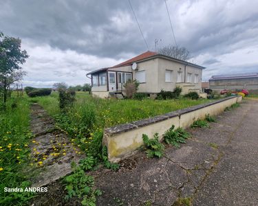 Pavillon individuel sur sous-sol complet avec 2 garages et jardin de 9.5 ares 