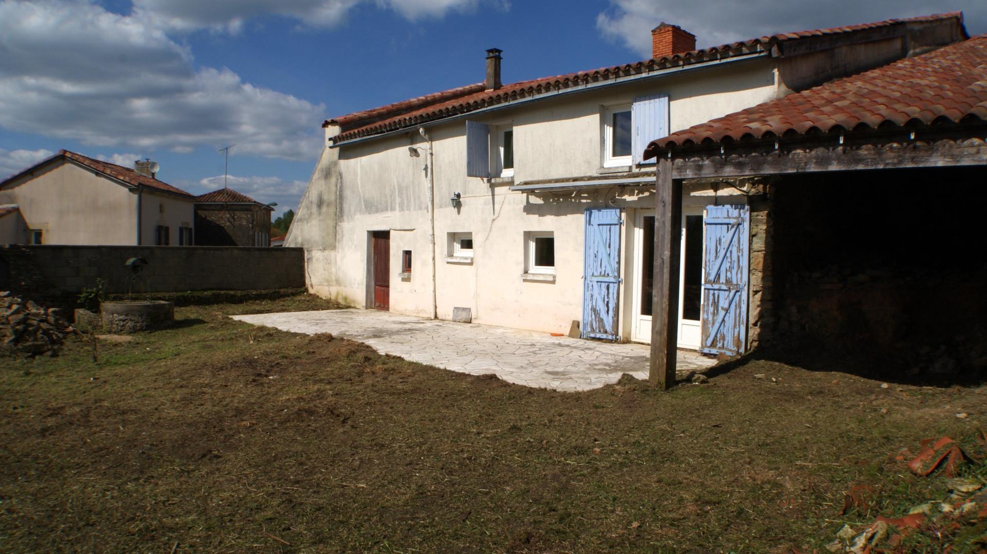 Maison en pierre 3 chambres garage et terrain