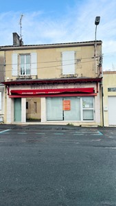 ENSEMBLE IMMOBILIER avec un magasin et appartement