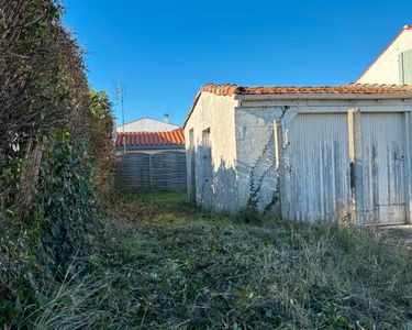 Garage sur parcelle constructible