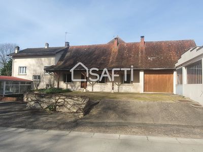 Ensemble immobilier de deux maisons et deux garages