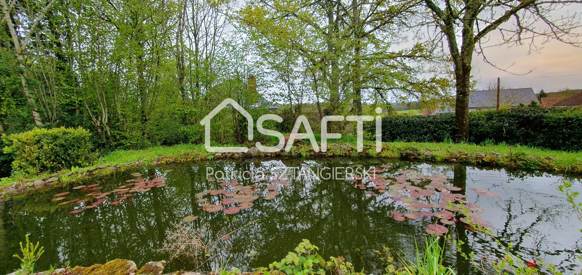 Belle villa d'architecte avec jardin paysagé au calme à la campagne. 