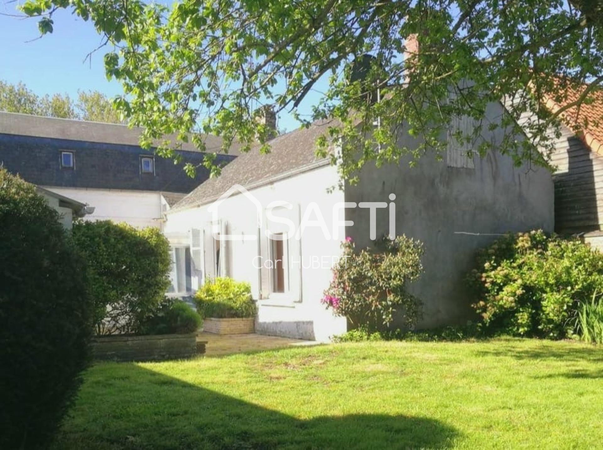 Belle maison avec commerce et jardin