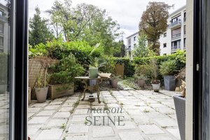 Neuilly Bagatelle - Appartement en rez de jardin - 1/2 chambre - Bel immeuble semi-récent - Jardin 