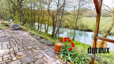 Charmante maisonnette en bordure de riviere