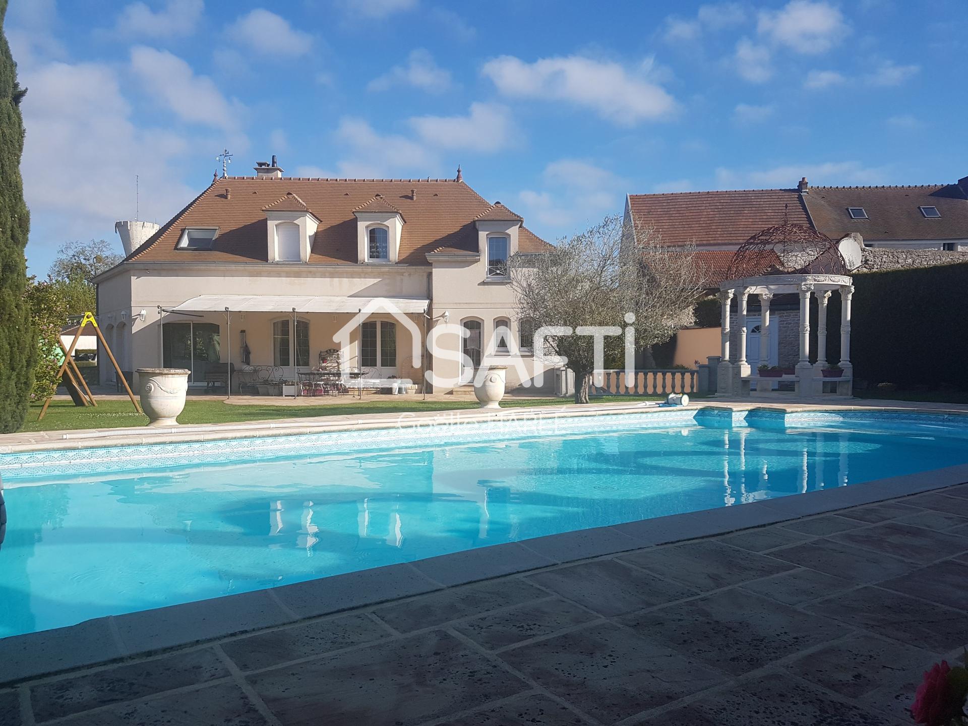 Maison individuelle à Drocourt avec piscine.