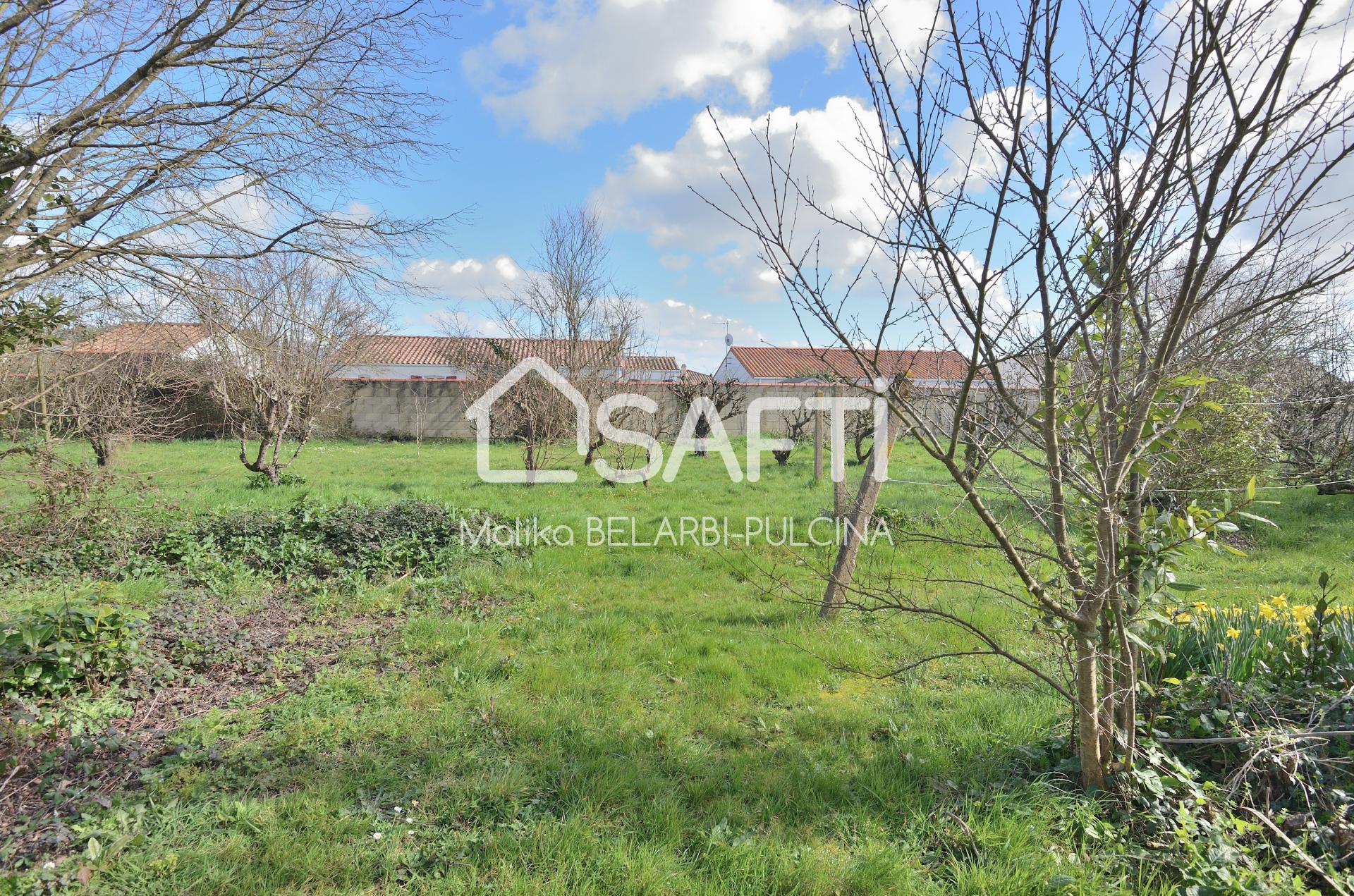 2133m² de terrain arboré, deux garages