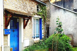 Maison de type F2 avec jardinet, actuellement louée