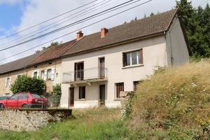 Maison de campagne à vendre ouvrant sur un petit coteau