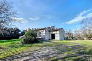 Maison fau calme, de plain-pied, avec beau jardin sur Auribail