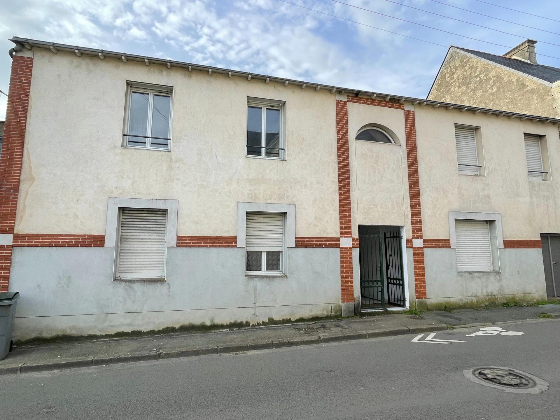 Ensemble immobilier comprenant 4 appartements.