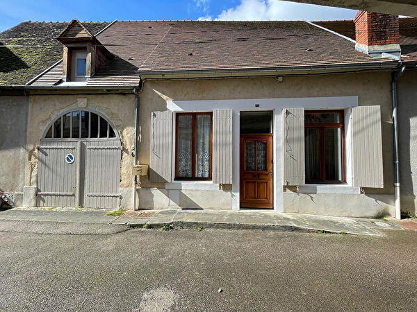 Maison de ville plein pied de 79.45m2, 2 chambres, grand garage, terrain