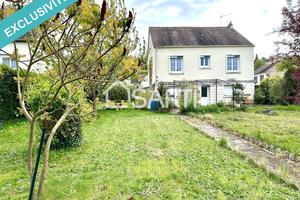 Maison au cadre paisible avec terrain spacieux