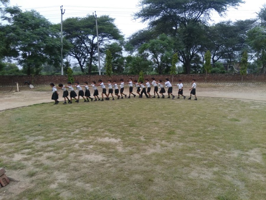 Nursery-KG Students Doing Activity in Ground On 06.08.18