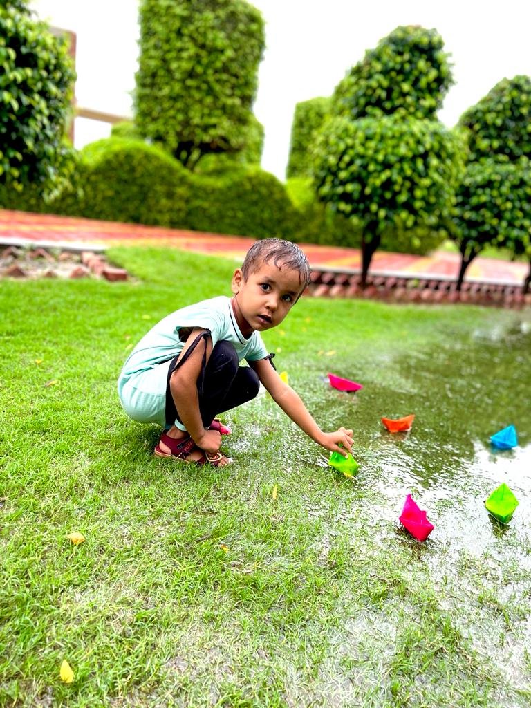 Rainy day celebrated and enjoyed by kids.