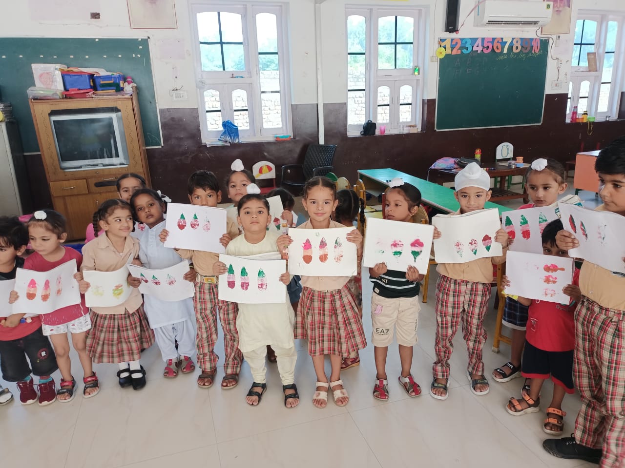 Leaf painting activity done by nursery kids