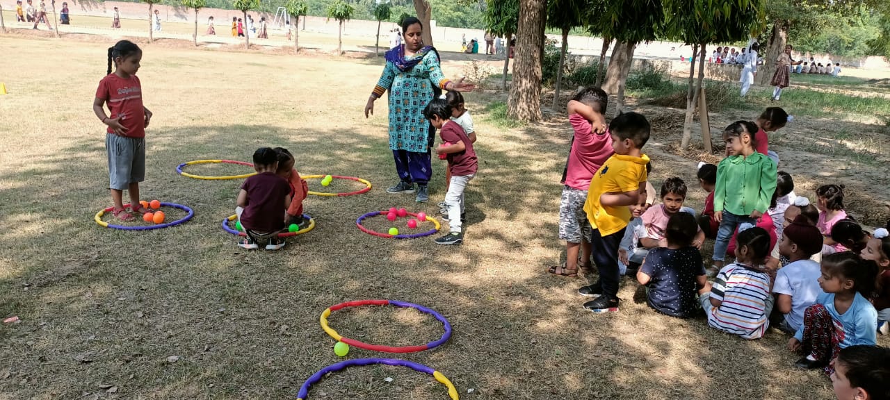 Pick and drop activity done by nursery class