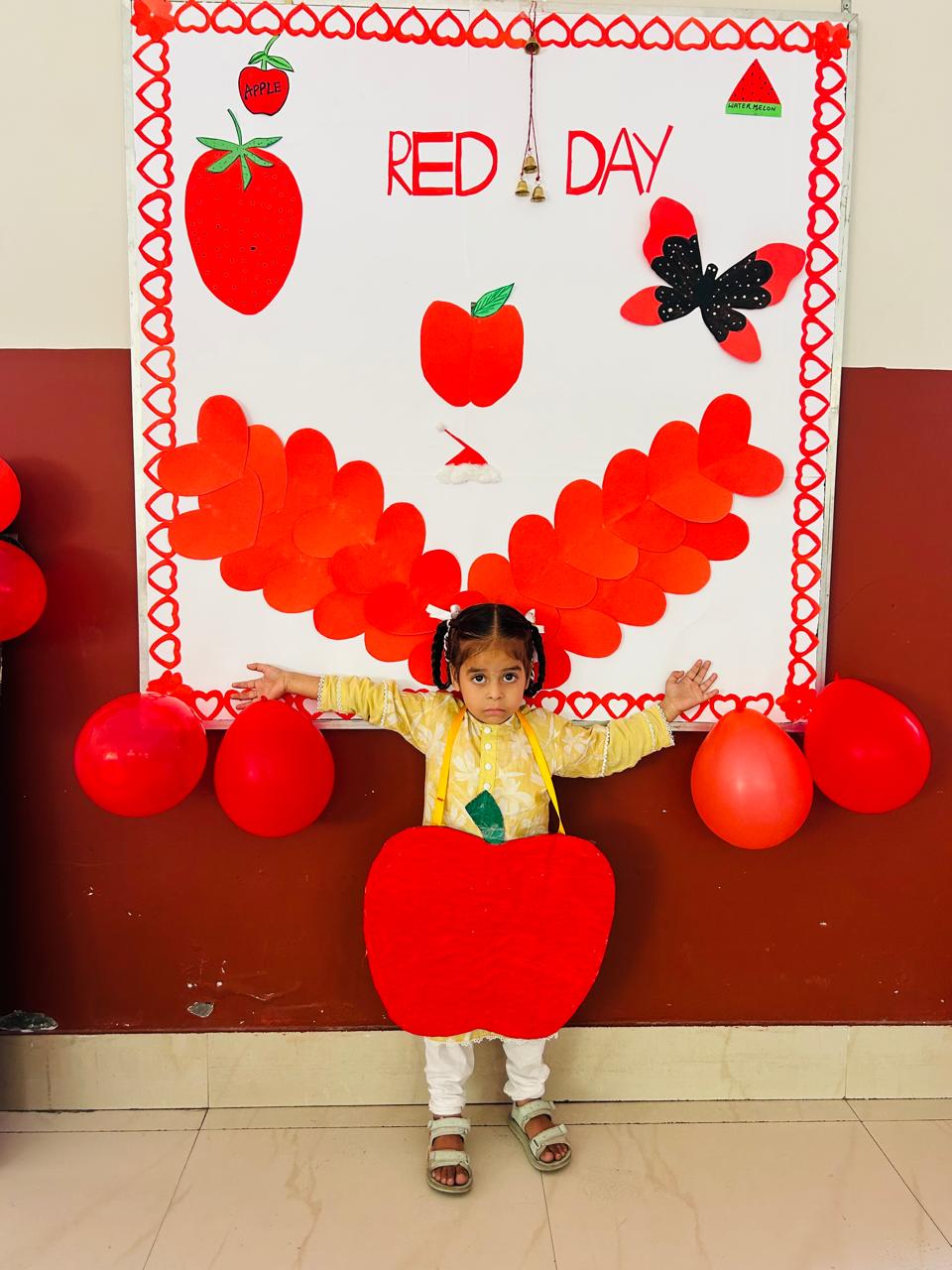 Activity done by nursery students to identify the red colour